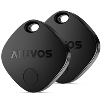 Two black ATUVOS Bluetooth trackers with a circular button.