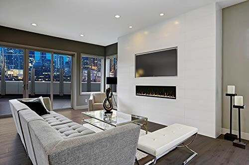 Modern living room with city view, featuring a sofa, glass table, and wall-mounted TV and fireplace.
