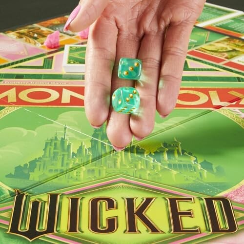 Hand holding dice over Monopoly Wicked board game.