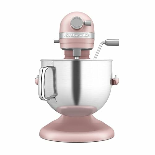 A luxurious pink stand mixer with a stainless steel bowl, perfect for baking enthusiasts